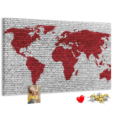 Tableau affichage liège Contour rouge du monde sur un mur de briques