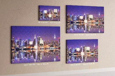 Tableau affichage liège Panorama nocturne de la ville avec reflet dans l'eau