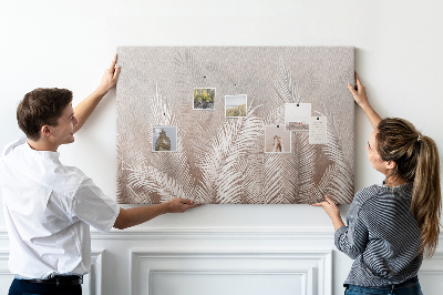 Tableau en liège Feuilles de palmier délicates sur fond neutre