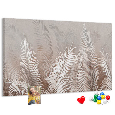 Tableau en liège Feuilles de palmier délicates sur fond neutre