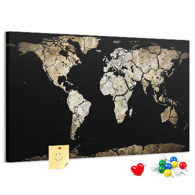 Tableau de liège Une carte du monde abîmée sur fond noir