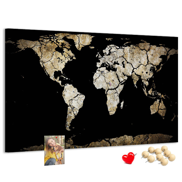 Tableau de liège Une carte du monde abîmée sur fond noir