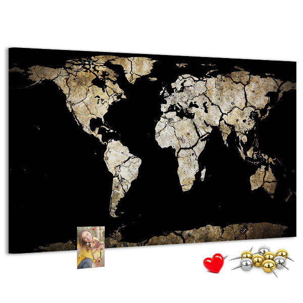 Tableau de liège Une carte du monde abîmée sur fond noir