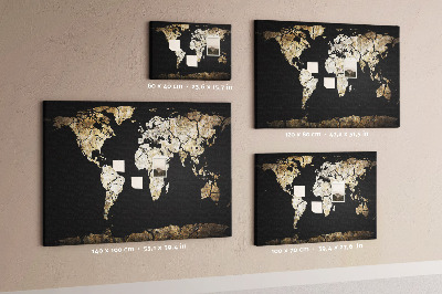 Tableau de liège Une carte du monde abîmée sur fond noir