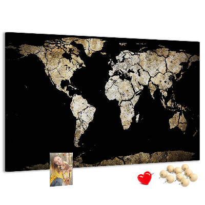 Tableau de liège Une carte du monde abîmée sur fond noir