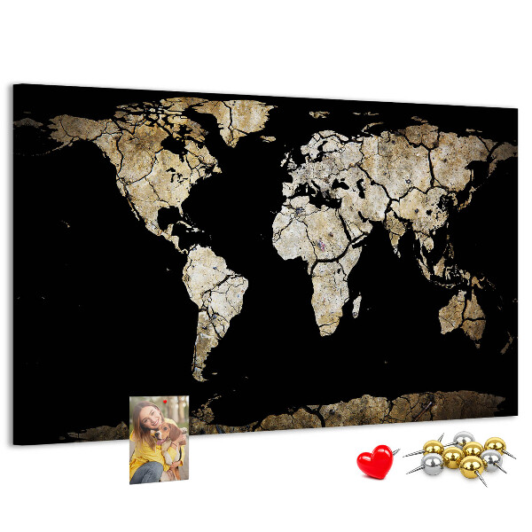 Tableau de liège Une carte du monde abîmée sur fond noir