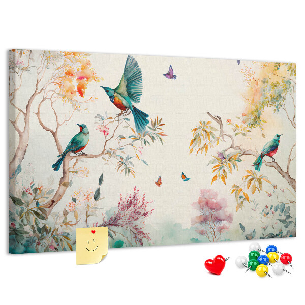 Tableau en liège Des oiseaux colorés dans un paysage printanier.