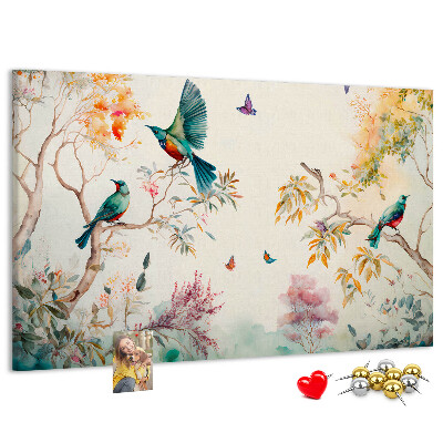 Tableau en liège Des oiseaux colorés dans un paysage printanier.
