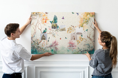Tableau en liège Des oiseaux colorés dans un paysage printanier.