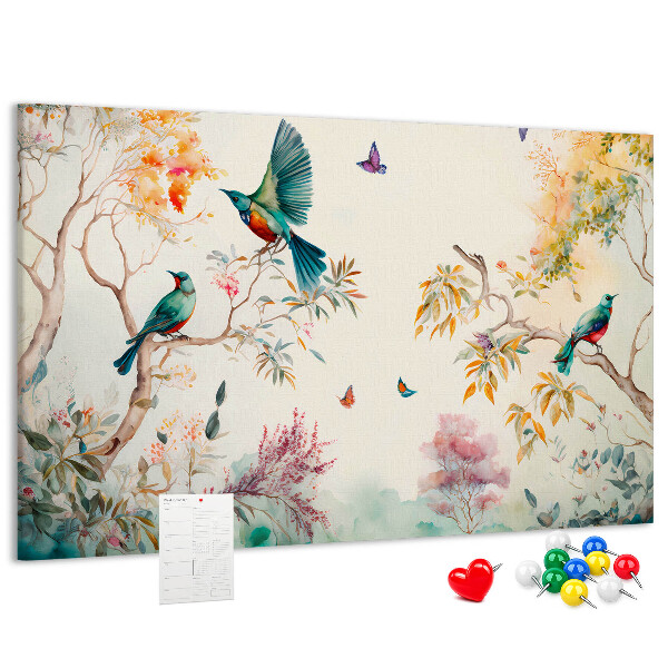 Tableau en liège Des oiseaux colorés dans un paysage printanier.