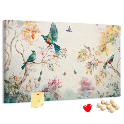 Tableau en liège Des oiseaux colorés dans un paysage printanier.