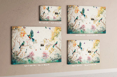 Tableau en liège Des oiseaux colorés dans un paysage printanier.