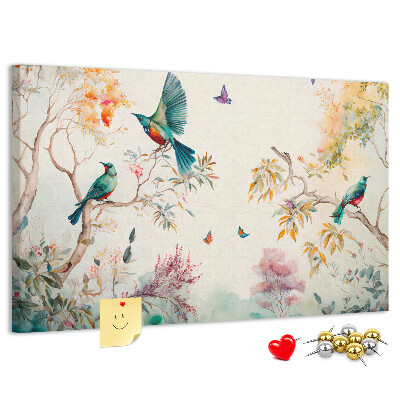 Tableau en liège Des oiseaux colorés dans un paysage printanier.