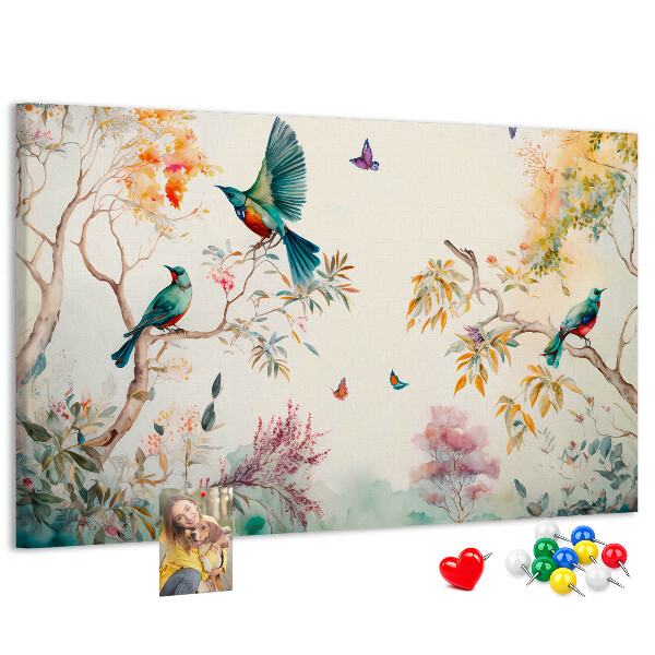 Tableau en liège Des oiseaux colorés dans un paysage printanier.