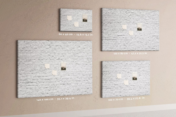 Tableau de liège Mur de briques blanches orné de punaises colorées