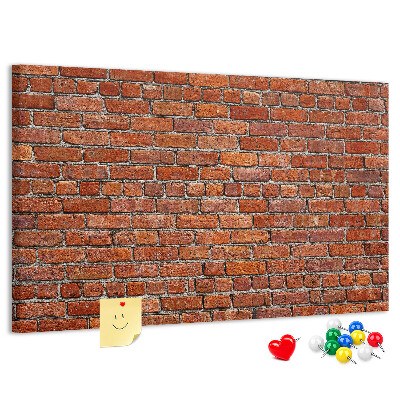Tableau de liège Mur de briques aux teintes chaudes.