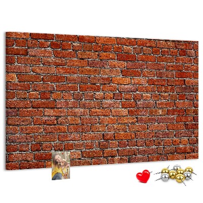Tableau de liège Mur de briques aux teintes chaudes.