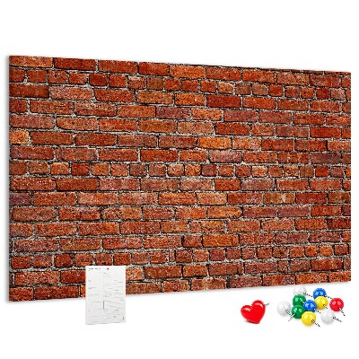 Tableau de liège Mur de briques aux teintes chaudes.