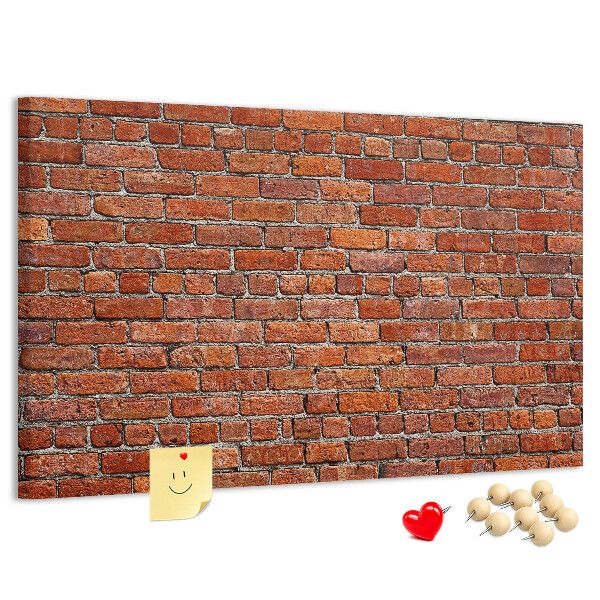 Tableau de liège Mur de briques aux teintes chaudes.