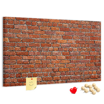 Tableau de liège Mur de briques aux teintes chaudes.