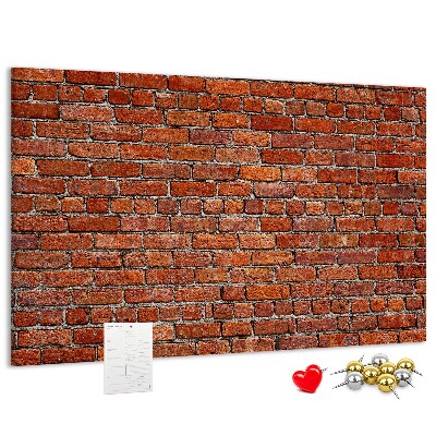 Tableau de liège Mur de briques aux teintes chaudes.