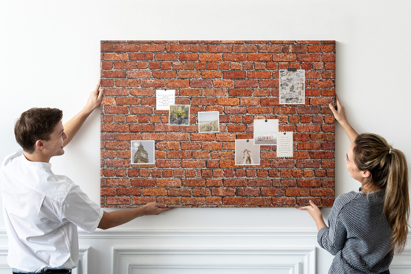 Tableau de liège Mur de briques aux teintes chaudes.