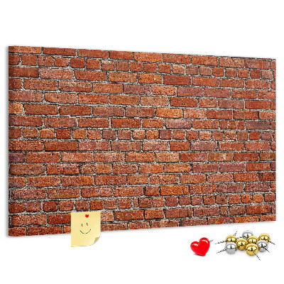 Tableau de liège Mur de briques aux teintes chaudes.