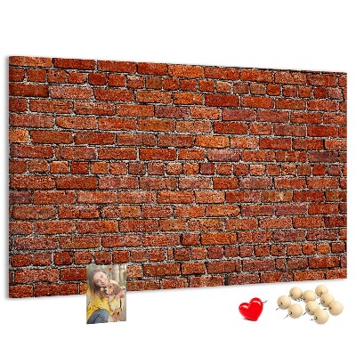 Tableau de liège Mur de briques aux teintes chaudes.