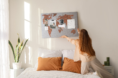 Tableau affichage liège Une carte du monde contre un mur de briques