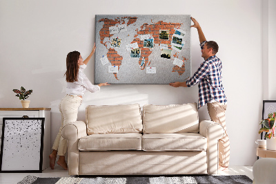 Tableau affichage liège Une carte du monde contre un mur de briques