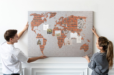 Tableau affichage liège Une carte du monde contre un mur de briques