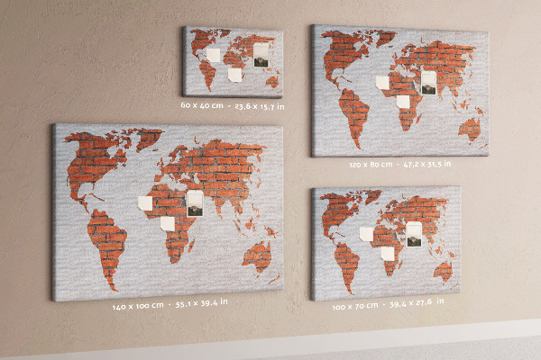 Tableau affichage liège Une carte du monde contre un mur de briques