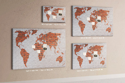 Tableau affichage liège Une carte du monde contre un mur de briques