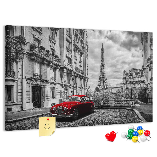 Tableau de liège Une voiture rouge avec Paris en arrière-plan