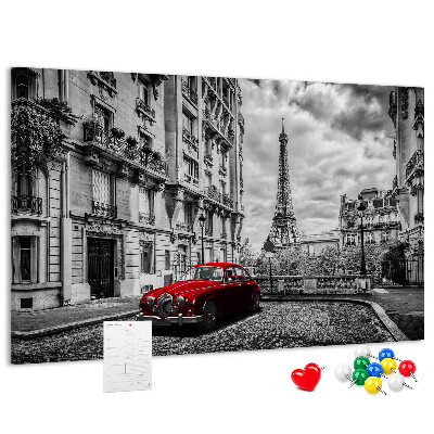 Tableau de liège Une voiture rouge avec Paris en arrière-plan
