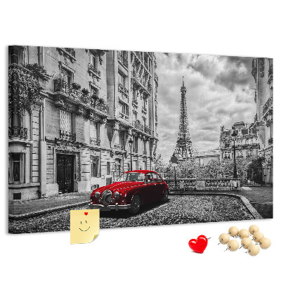 Tableau de liège Une voiture rouge avec Paris en arrière-plan