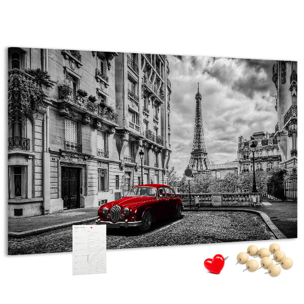 Tableau de liège Une voiture rouge avec Paris en arrière-plan