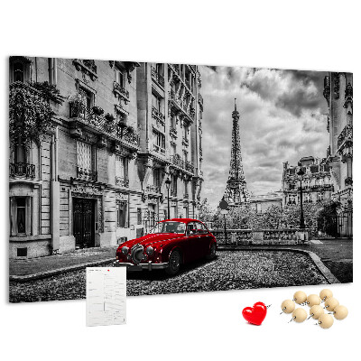 Tableau de liège Une voiture rouge avec Paris en arrière-plan