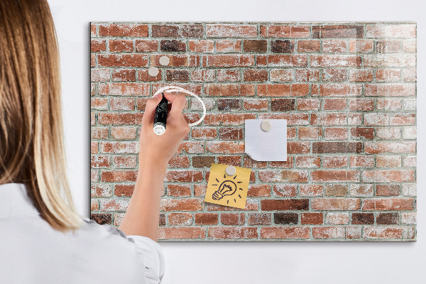 Tableau magnétique effaçable Panneau photo sur un mur de briques