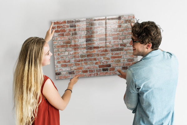 Tableau magnétique effaçable Panneau photo sur un mur de briques