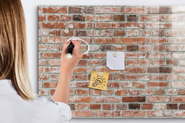 Tableau magnétique effaçable Panneau photo sur un mur de briques