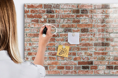 Tableau magnétique effaçable Panneau photo sur un mur de briques