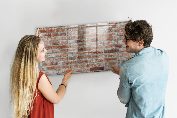 Tableau magnétique effaçable Panneau photo sur un mur de briques