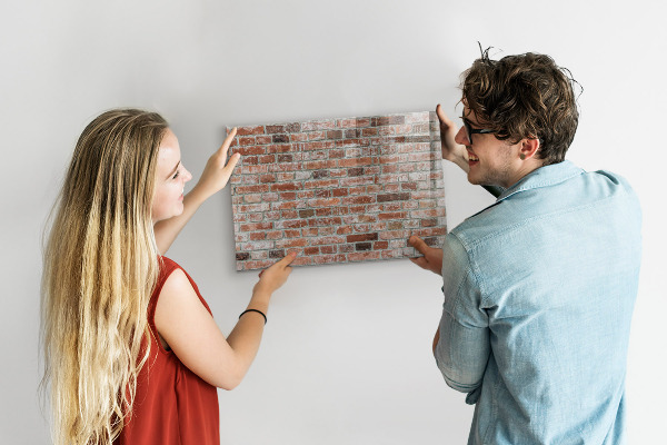 Tableau magnétique effaçable Panneau photo sur un mur de briques