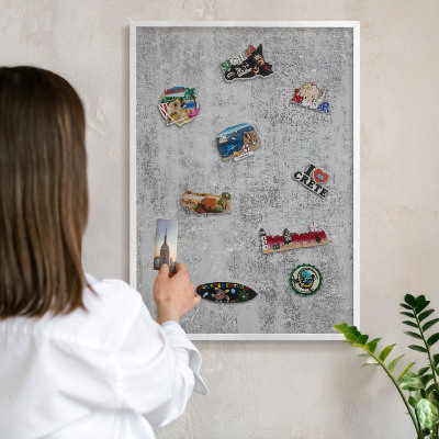 Tableau mural pour aimants dans un cadre noir Surface grise