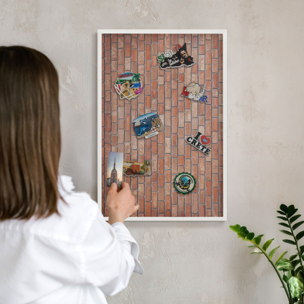 Tableau mural pour aimants dans un cadre noir Mur de briques