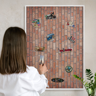 Tableau mural pour aimants dans un cadre noir Mur de briques