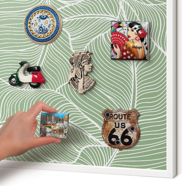 Tableau mural pour aimants dans un cadre noir Feuilles tropicales