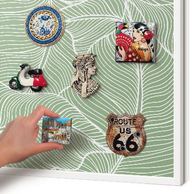 Tableau mural pour aimants dans un cadre noir Feuilles tropicales