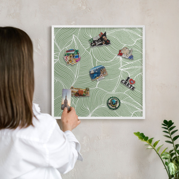 Tableau mural pour aimants dans un cadre noir Feuilles tropicales